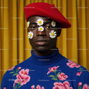 Stylish man with daisy face art and floral sweater