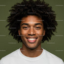Young Man with Curly Afro Hair Smiling Portrait