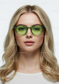 Fashionable Blonde Woman Wearing Green Sunglasses in Model Portrait