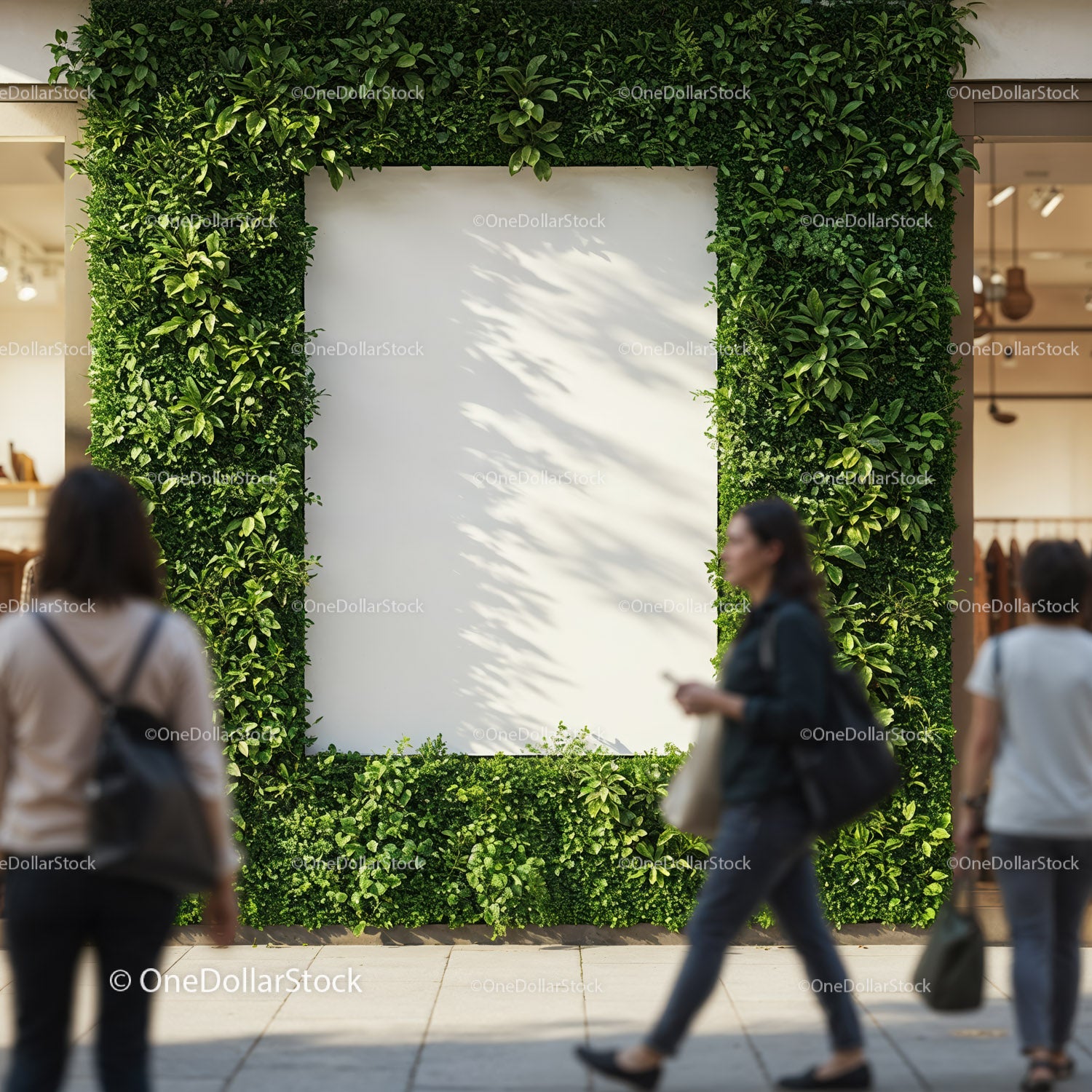 Urban green wall with blank white poster and walking people