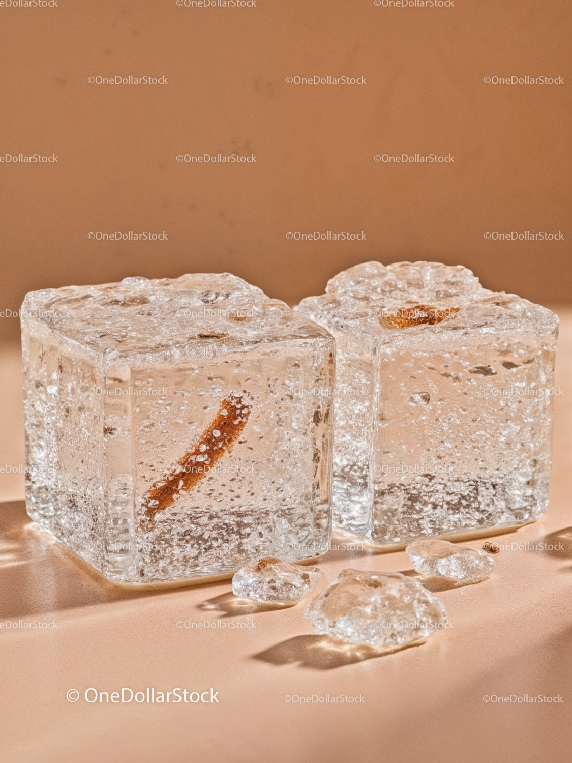 Close up of clear ice cubes with cinnamon inside
