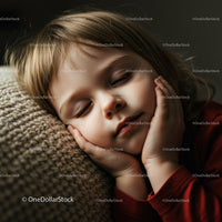 Peaceful child resting head on cozy knitted pillow