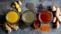 Fresh Ginger Roots, Turmeric Powder and Herbal Tea on Rustic Surface