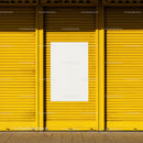 Bright Yellow Metal Shutter with Blank White Poster