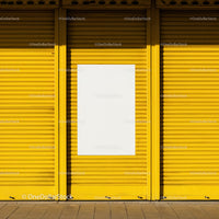 Bright Yellow Metal Shutter with Blank White Poster