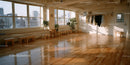 Bright Urban Dance Studio with Large Windows and Wooden Floor