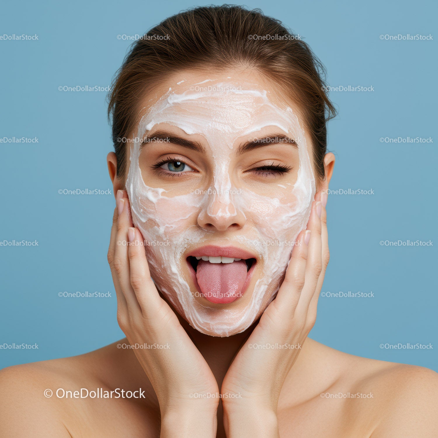 Young Woman Wearing Cream Facial Mask and Smiling Brightly