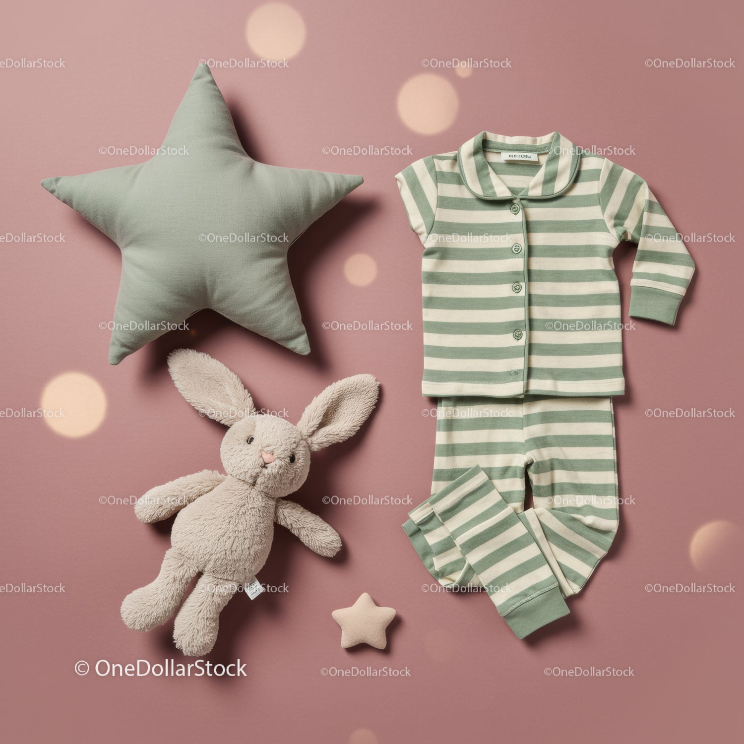 Soft striped baby pajamas with plush bunny and star pillow