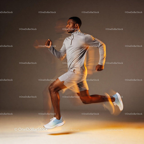 Athletic man sprinting indoors with motion blur effect