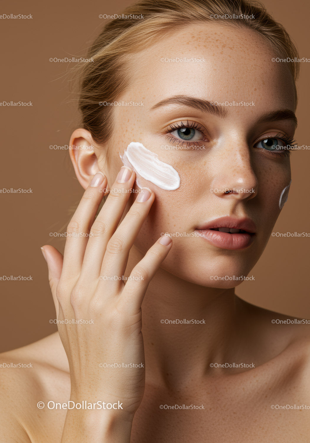 Close-up of a Woman Applying Skincare Cream for Healthy Glowing Skin