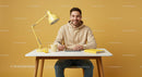 Smiling Man in Casual Attire at Modern Yellow Workspace