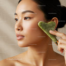 Close-Up of Woman Using Jade Gua Sha for Facial Massage and Skin Rejuvenation