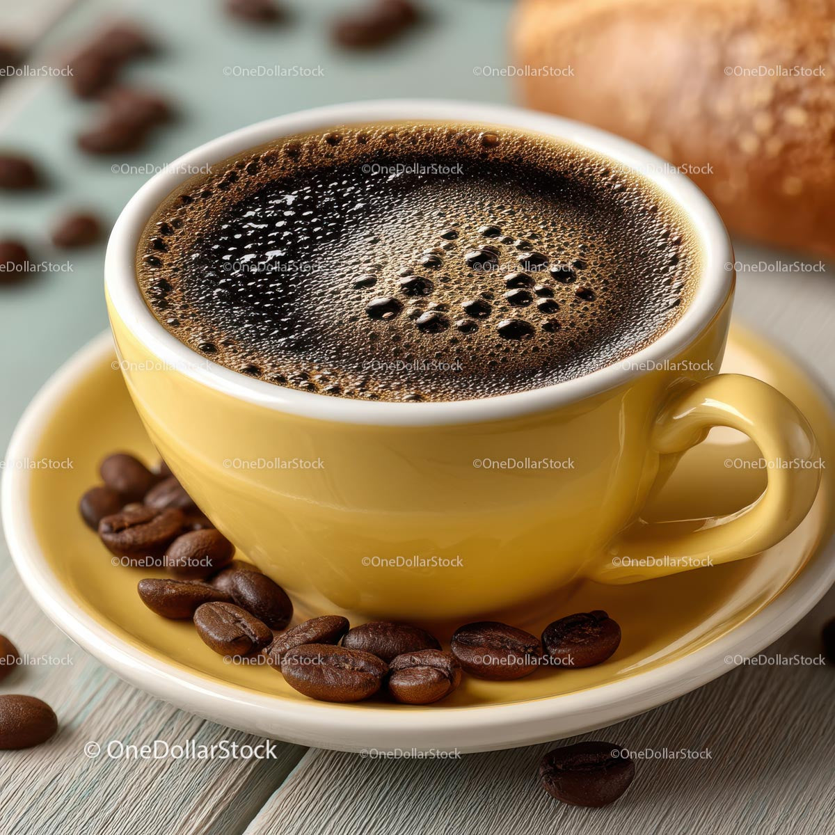 Delicious Hot Coffee in a Yellow Cup with Coffee Beans