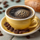 Delicious Hot Coffee in a Yellow Cup with Coffee Beans