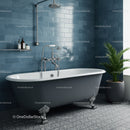 Classic freestanding bathtub with modern blue tiled walls