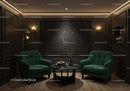 Cozy seating area with green armchairs and star map art