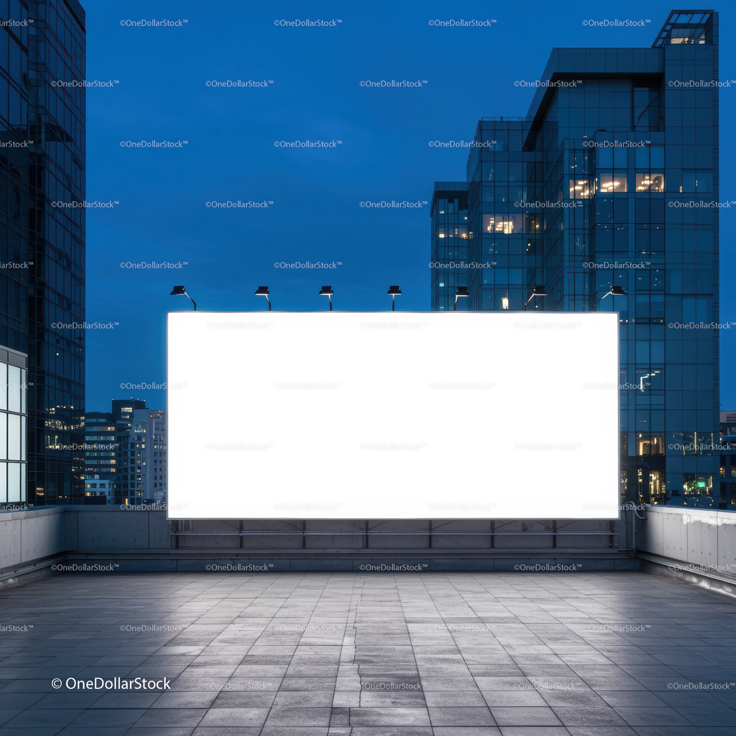 Empty illuminated billboard on urban rooftop at dusk