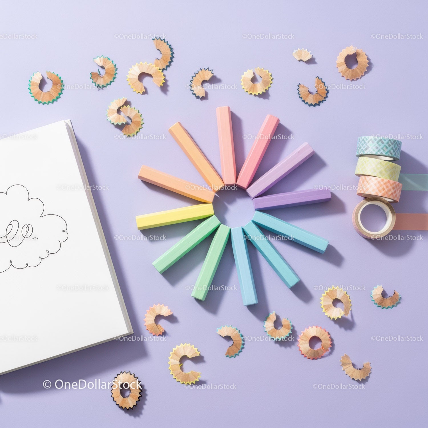 Pastel Chalks Arranged in Circle with Sketchbook and Tape