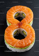 Salmon and avocado sushi rings with caviar topping
