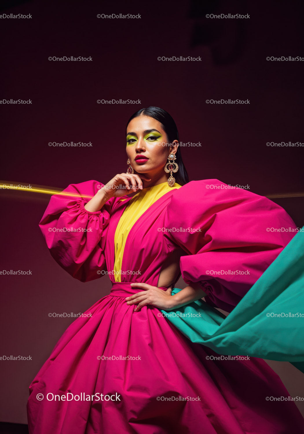 Fashion Model in Vibrant Pink and Yellow Flowing Gown