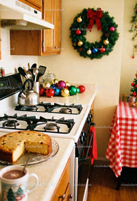 Cozy kitchen with Christmas decorations and homemade cake