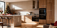 Modern kitchen with Christmas tree and holiday decor