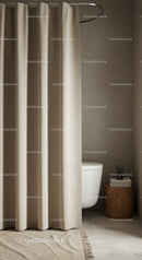 Minimalist Bathroom with Beige Shower Curtain and Wooden Side Table