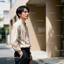 Thoughtful man standing outdoors in urban environment