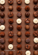 Assorted gourmet chocolate truffles and meringues