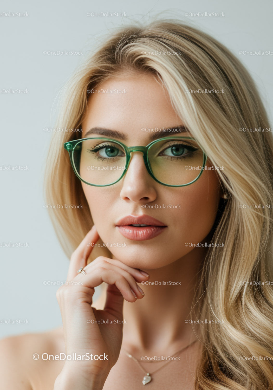 Portrait of a Beautiful Blonde Woman with Green Glasses and Blue Eyes