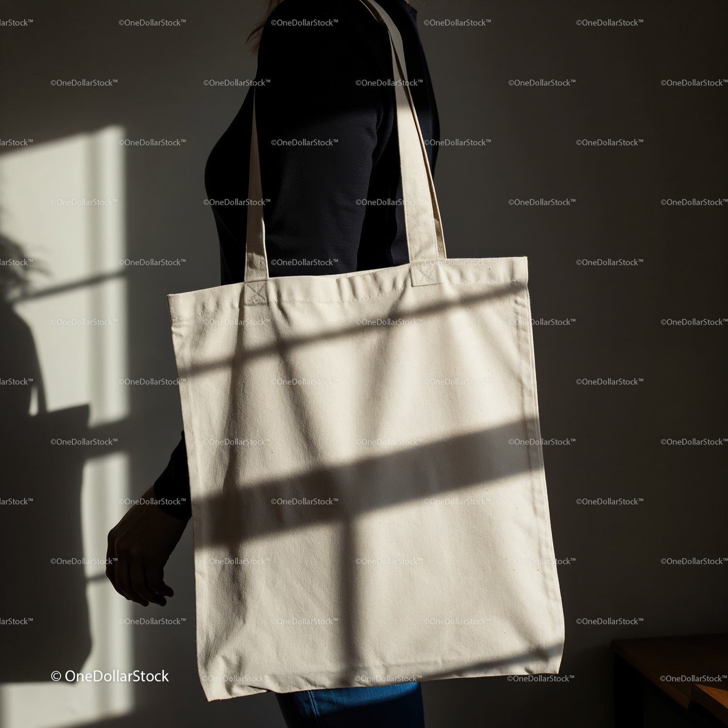 Person Carrying Minimalist Canvas Tote Bag in Soft Light