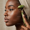 Close-Up of Black Woman Receiving Facial Massage with Jade Roller for Skincare