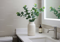 Green Eucalyptus Plant in Ceramic Vase on White Kitchen Counter