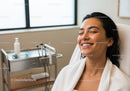Smiling Woman Relaxing in Dental Clinic for Oral Health Care