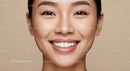 Close-up of joyful young woman with radiant smile