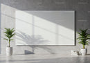 Minimalist room with blank canvas and tropical plants