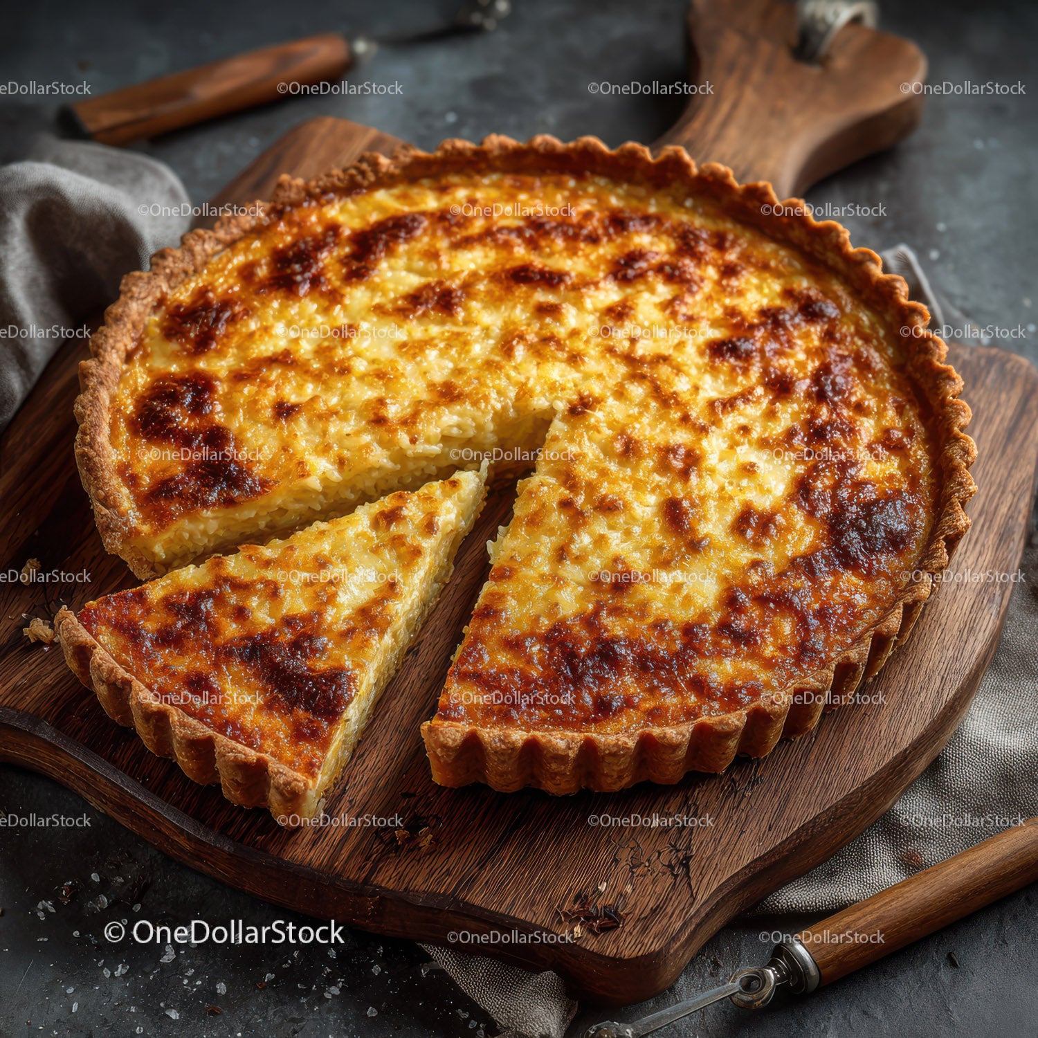 Golden Cheesy Quiche with Crispy Crust on Wooden Board