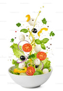 Fresh colorful salad ingredients tossed in white bowl
