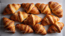 Assorted Fresh Croissants in a Bakery Display