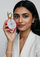 Vibrant Woman with Fresh Dragon Fruit in Modern Studio Setting
