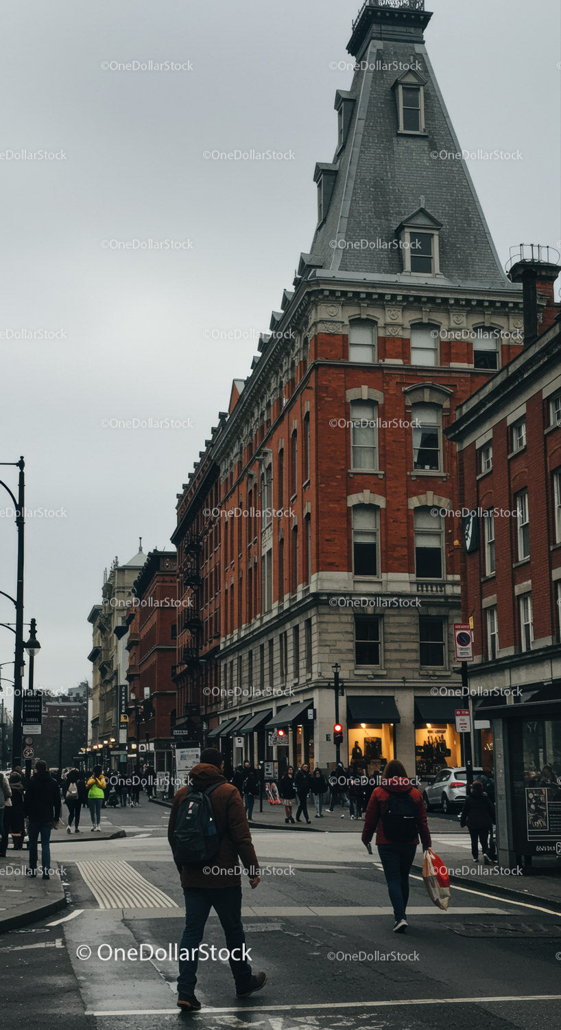 Historic Red Brick Building with Tower in Urban City Street Scene