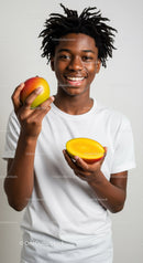 Happy Young Man Holding Apples with Bright Positive Atmosphere