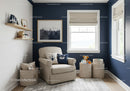 Modern Kids Room with Cozy Beige Armchair and Storage Bins