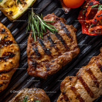 Juicy Grilled Meat with Fresh Herbs and Vegetables on Grill