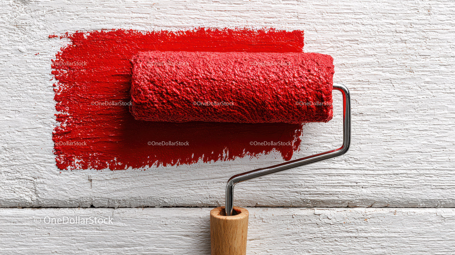 Red Paint on White Wooden Surface Using Paint Roller for Wall Decoration
