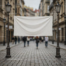 Blank Banner Hanging Between Vintage Street Lamps in Old Town