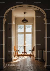 Sunlit cozy dining nook with wooden table and chairs