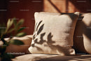Decorative Beige Velvet Pillow with Leaf Shadow and Sunlight