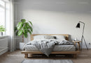 Modern Scandinavian Bedroom with Green Monstera Plant and Cozy Bed