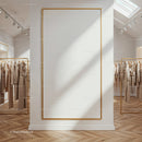 Minimalist fashion boutique interior with neutral coats
